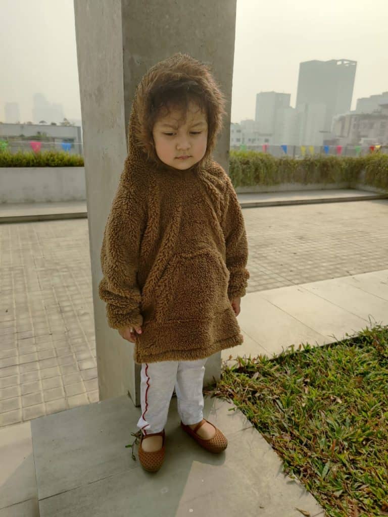 The image displays Gorur Ghash newest collection of a cute oversized hoodie for kids (toddlers). The hoodie comes in brown and is known as The Monkey. It has been proudly made in Bangladesh (BD)